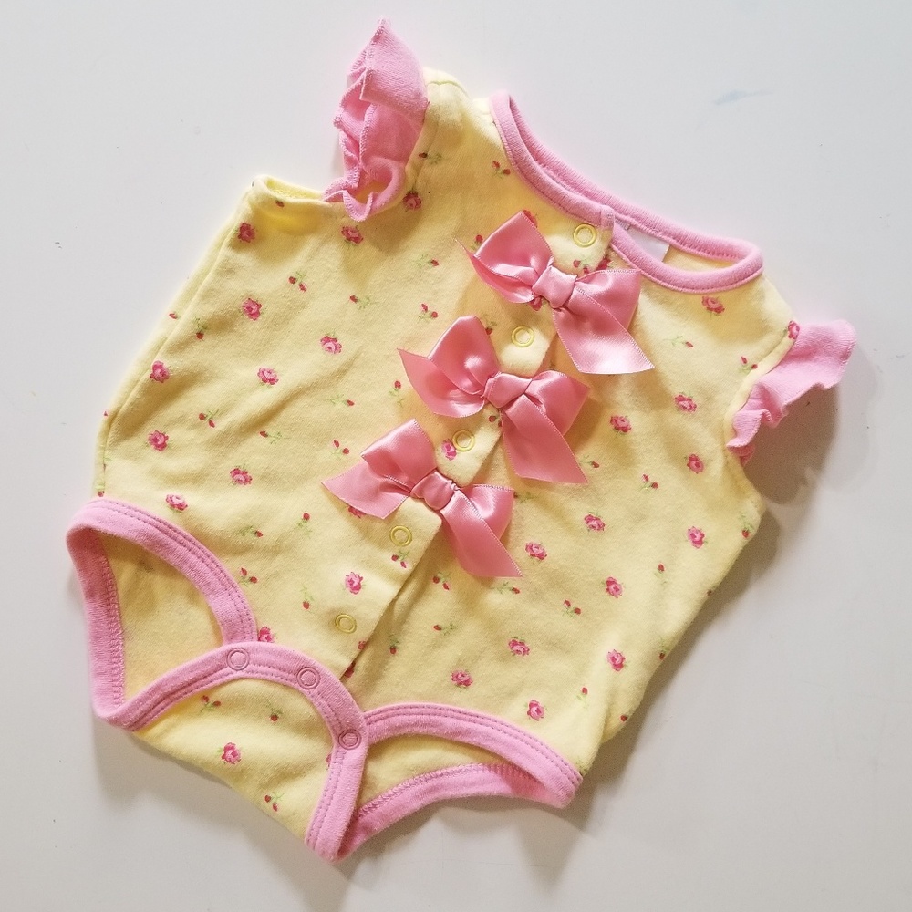 First Impressions Boutique bodysuit with bows